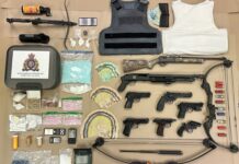 Loaded shotgun, drugs and cash seized from Whalley residence