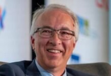 NDP slams Rustad for allowing his MLAs to double dip