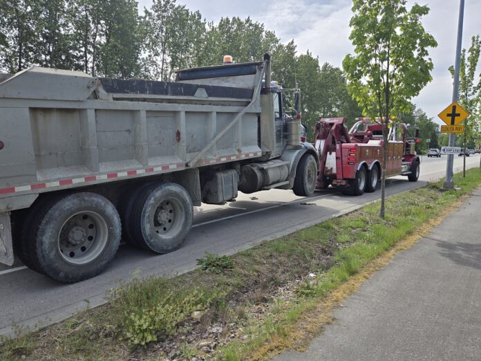 BURNABY RCMP dump truck Towed Dump Truck
