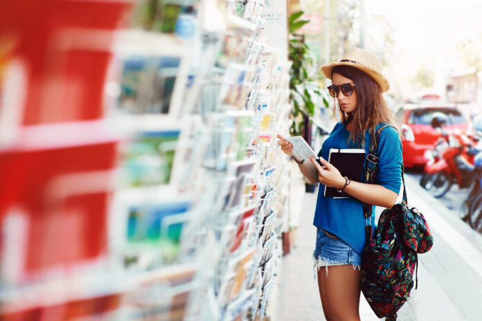 Young,Girl,Chooses,A,Postcard
