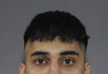 Surrey Police release photo of suspect to help with extortion investigations