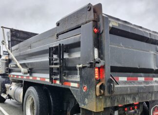 Commercial vehicle loses two wheels on Barnet Highway
