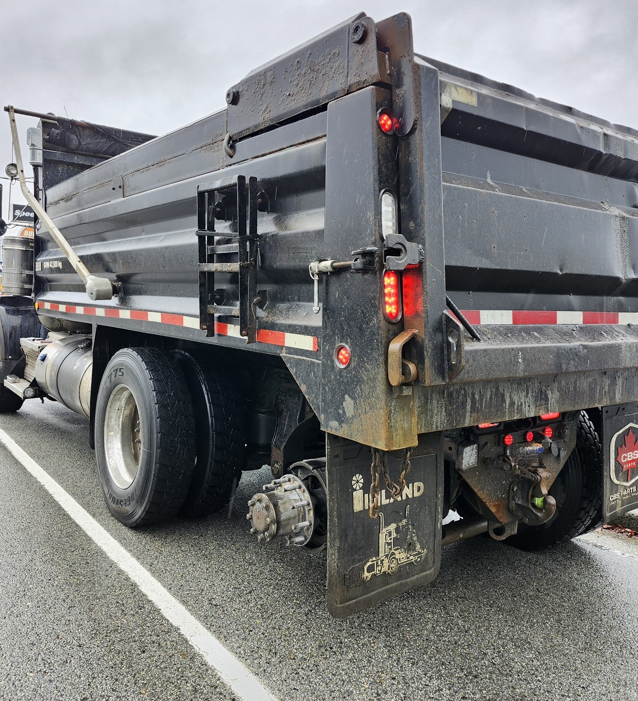 Commercial vehicle loses two wheels on Barnet Highway