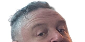 Surrey Police request public’s help to located wanted suspect