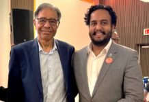 Burnaby Citizens Association’s Kiran Singh gets a boost from Sav Dhaliwal
